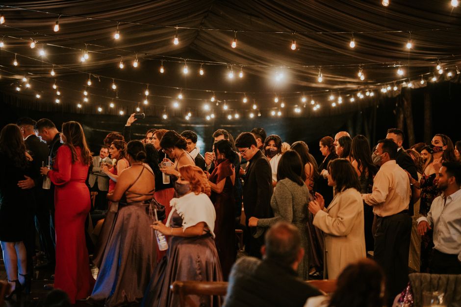 Wedding reception guests dancing
